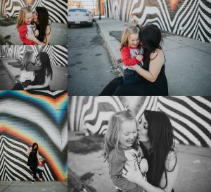 Little girl and her mom playing in the Eastern Market by the Zebra Rainbow Wall Mural