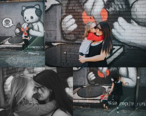 Little girl and her mom playing in the Eastern Market by the Zebra Rainbow Wall Mural