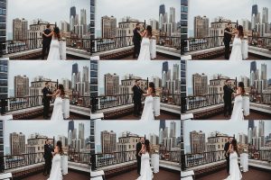 first look on a roof top with Chicago skyline behind them