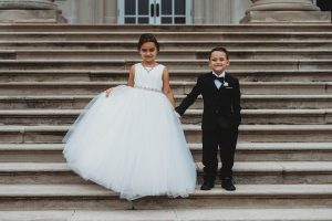 flower girl and ring bearer on the steps of the Chicago history museum