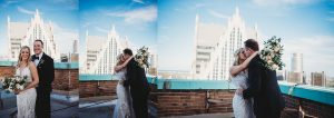 bride and groom kissing on top of the guardian building detroit