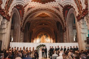 bride and groom getting married at the Guardian building in Detroit
