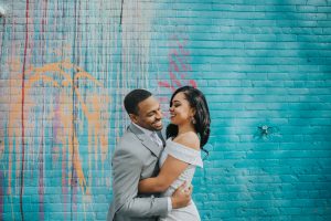 elopement in downtown detroit in front of a graffiti wall