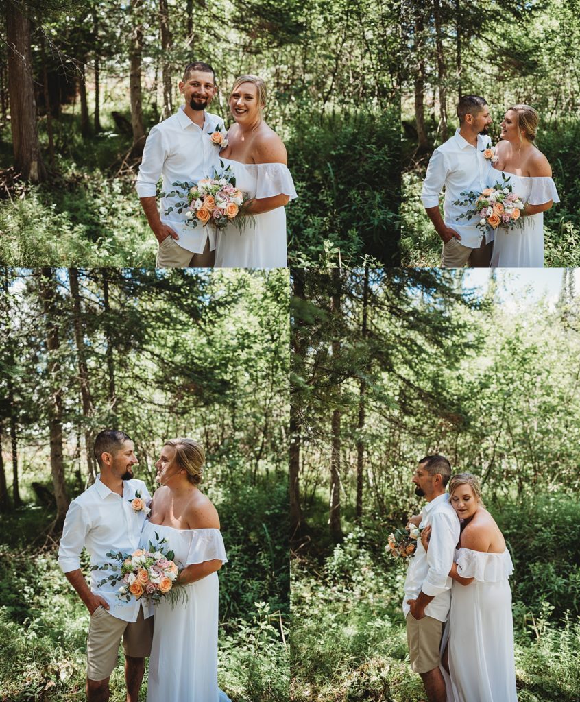 bride and groom laughing and smiling in woods in northern michigan