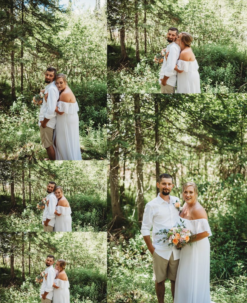 bride and groom laughing and smiling in the woods in northern michigan