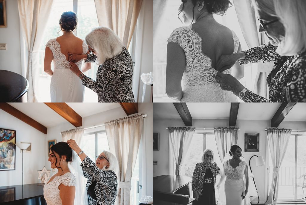 bride getting dressed with her mom in her living room