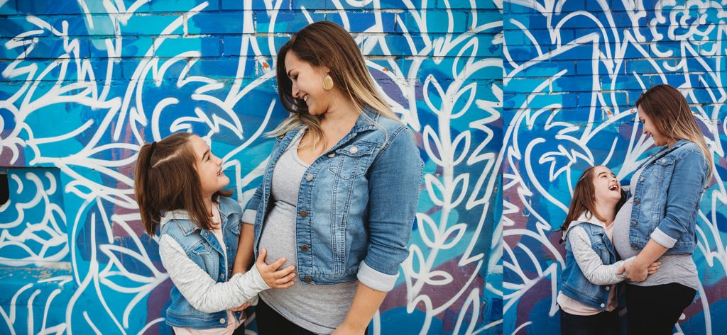pregnant mom and daughter laughing 